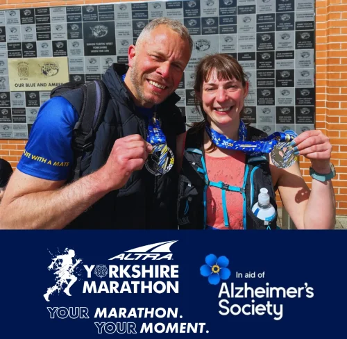 Gareth holding Leeds marathon medal